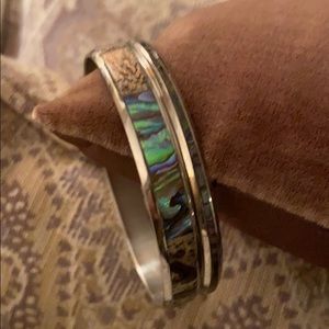 Two silver bangles with inlaid abalone